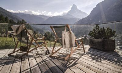 Balcony of a room of the category "Huntsman" at the sustainable hotel CERVO Mountain Resort in Switzerland with a view of the Matterhorn.
